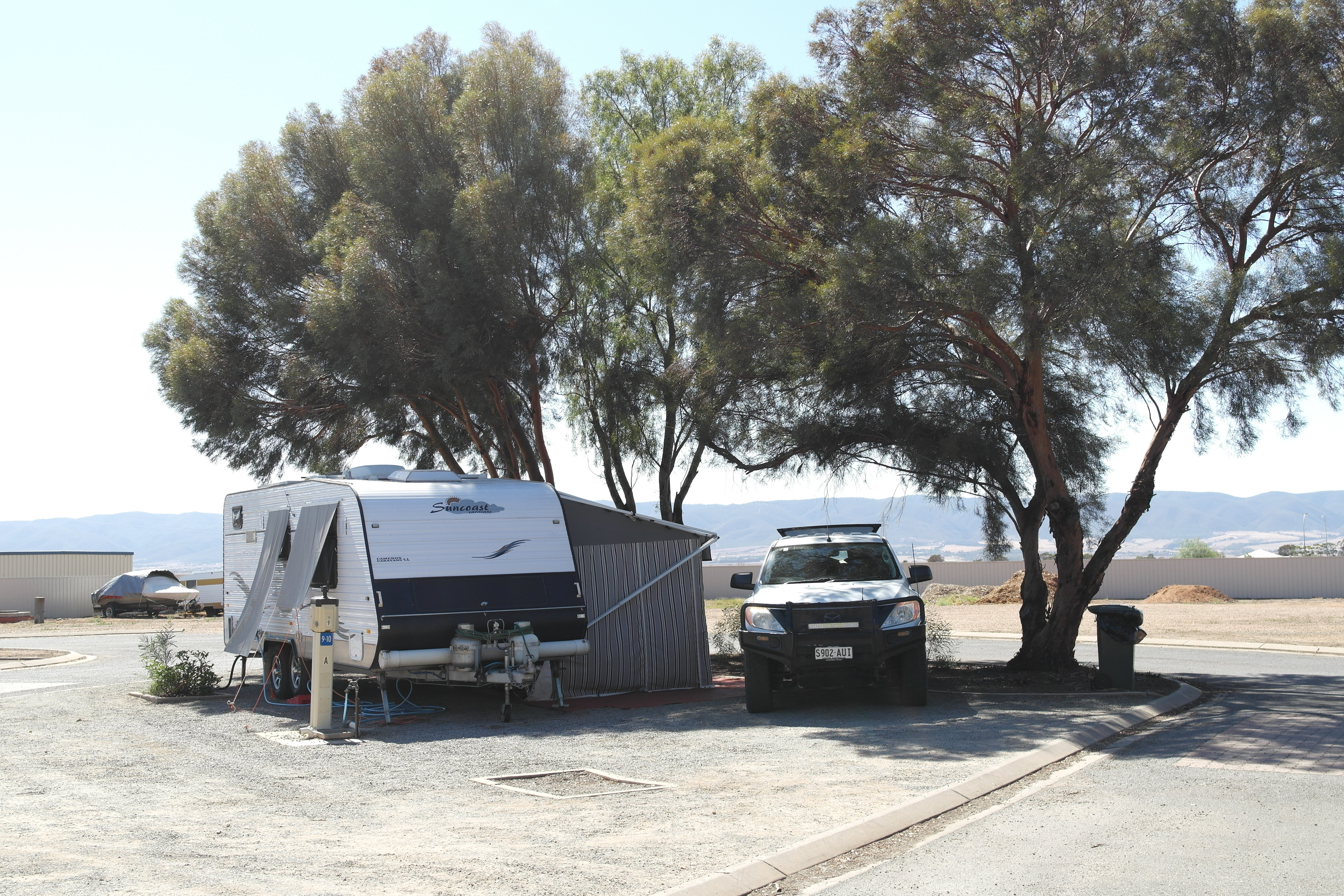 Caravan camped at a powered site at Port Pire Beach Caravan Park