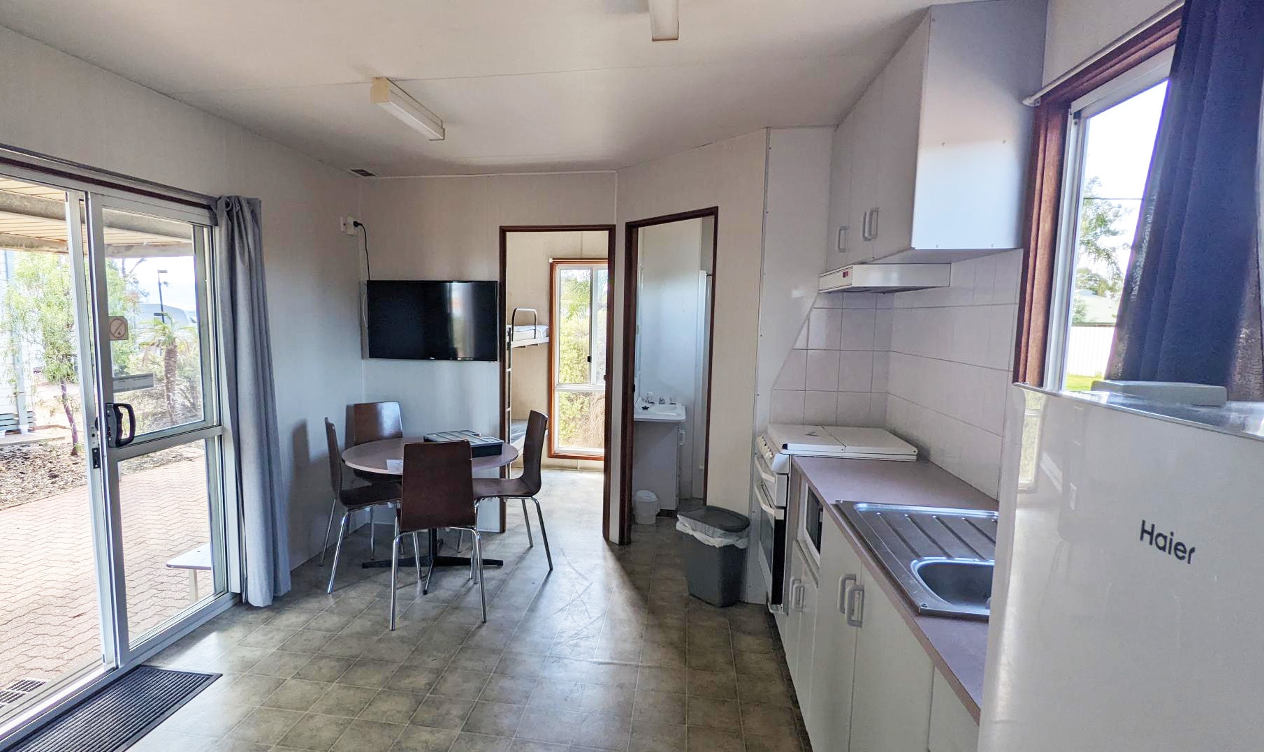 kitchenette and open plan living area in Port Pirie Beach Caravan Park
